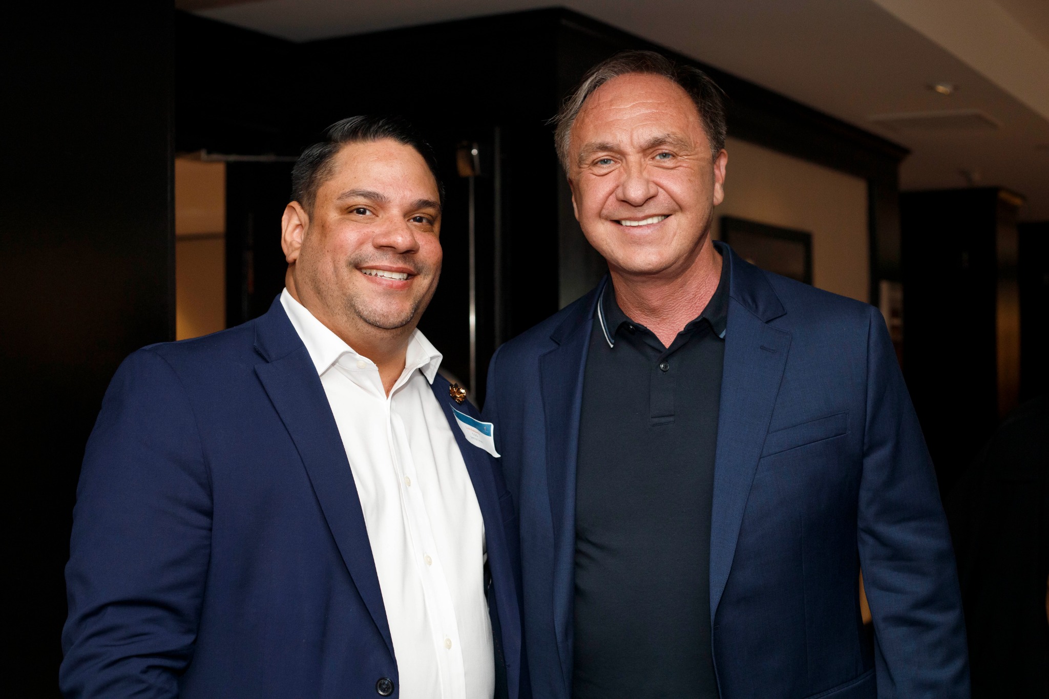 Two attendees posing together